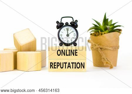 Online Reputation Symbol. Wooden Blocks With Concept Words Online Reputation On Beautiful White Back