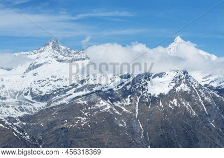 Idyllic Landscape Of Panorama Of Snow Mountain In Swiss
