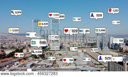 Social Media Icons Fly Over City Downtown Showing People Engagement Connection Through Social Networ