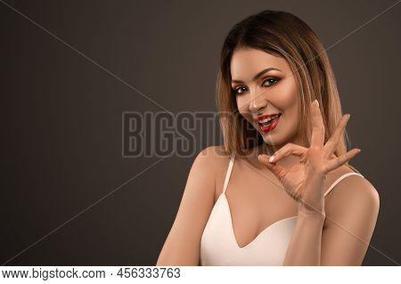 Beautiful Flirty Woman. Clear Skin. Spa Concept. Natural Beauty. Stylish Model