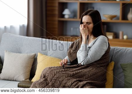 Young Woman Woman Taking Off Eyeglasses Feeling Eye Strain.tired Woman With Closed Eyes Massaging Ey