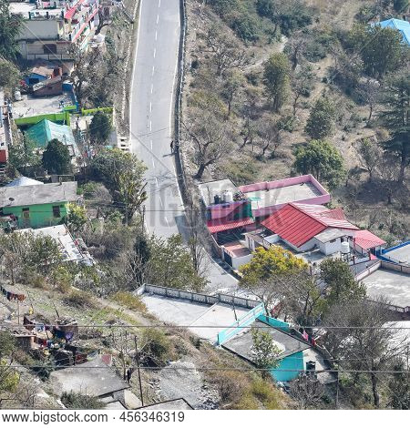 Aerial Top View Of Traffic Vehicles Driving At Mountains Roads At Nainital, Uttarakhand, India, View