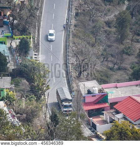 Aerial Top View Of Traffic Vehicles Driving At Mountains Roads At Nainital, Uttarakhand, India, View