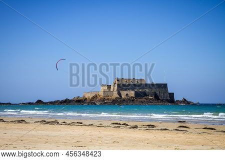 Fort National Island And A Kite Surfer On Sea In Saint-malo City, Brittany, France