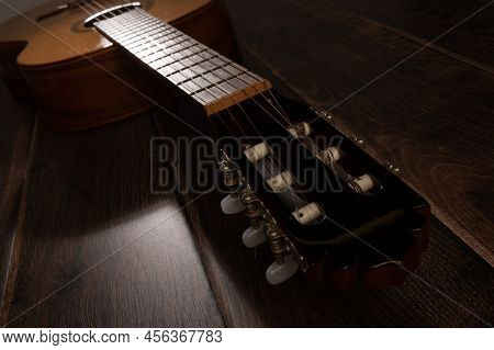 Classical Guitar Machine Head And Fretboard Up Close.