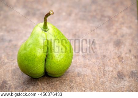 A Pear Looks Like A Botty, Cellulite Skin Or Weight Loss Diet Concept With Copy Space
