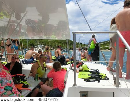 The People At Snorkeling Underwater And Fishing Tour By Boat At The Caribbean Sea At Honeymoon Beach