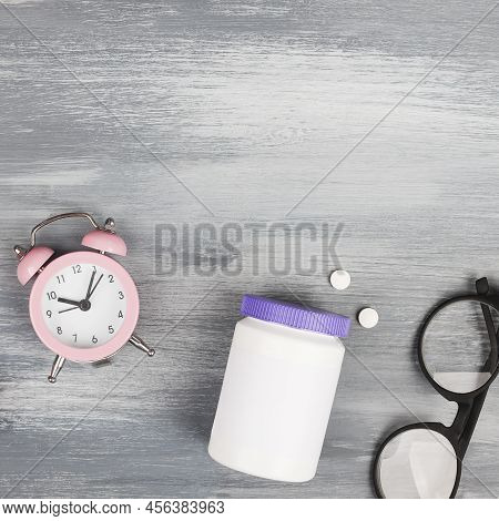 Women Health, Middle Age And Menopause Concept. Health Care Style. Copy Space.plastic Bottle With Pi