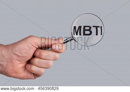 Mbti Acronym Through Magnifying Glass. High Quality Photo