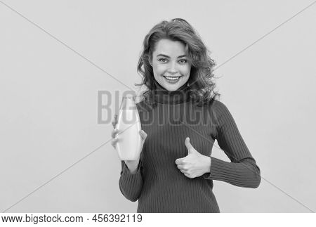 Happy Woman Use Shower Gel. Girl Curly Hair Hold Shampoo Bottle Show Thumb Up.