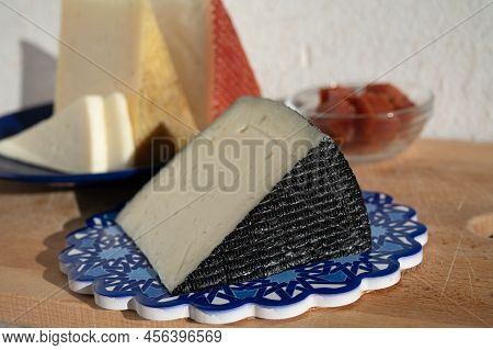 Spanish Hard Manchego, Cow, Sheep And Goat Cheeses Served Outdoor With Membrillo Jam In Sunlights