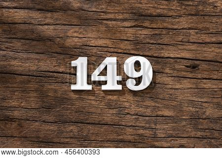 Number 149 - Piece On Rustic Wood Background