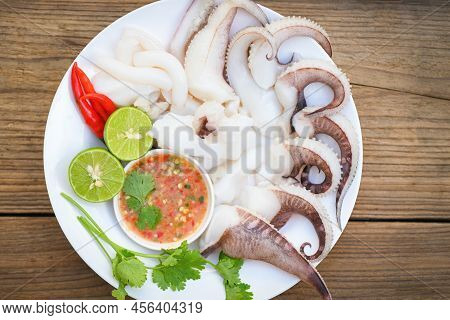 Seafood Plate Squid Food On White Plate, Fresh Squid Cooked Boiled Steam With Vegetable Salad Lemon 