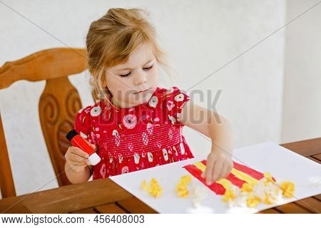 Little Creative Toddler Girl Painting With Finger Colors Popcorn Box And Making Paper Corns With Glu