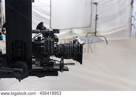 Movie Shooting Or Video Production And Film Crew Team With Camera Equipment. Video Camera Operator W