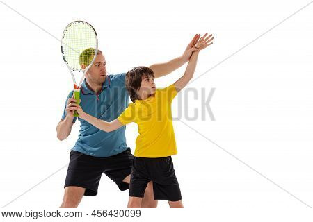Tennis Lesson. Professional Tennis Player, Instructor Shows Basic Techniques In Game Of Tennis To Sc