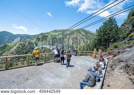 Canillo, Andorra. 2022 June 9. People Walking On The Longest Tibetan Bridge In Europe, 600 Meters Lo
