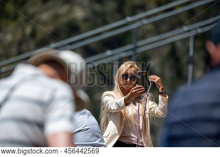 Canillo, Andorra. 2022 June 9. People Walking On The Longest Tibetan Bridge In Europe, 600 Meters Lo