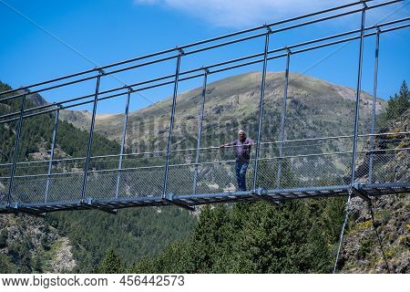 Canillo, Andorra. 2022 June 9. People Walking On The Longest Tibetan Bridge In Europe, 600 Meters Lo