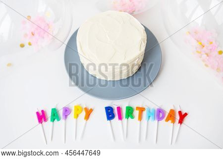 Colorful Candles With Happy Birthday Lettering Isolated On White Background Along With Confetti And 