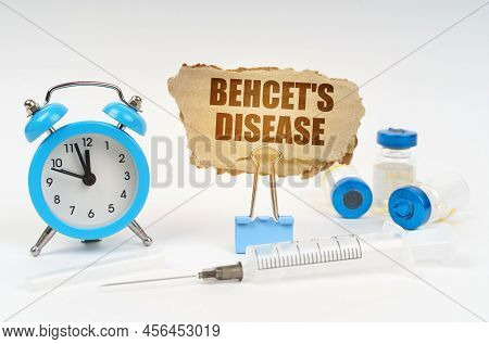 Medical Concept. Near The Stethoscope Are A Syringe, Ampoules And A Clip With A Cardboard Plate - Be
