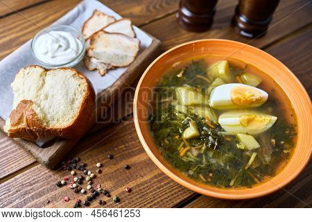 Broth With Egg And Bread With Sour Cream