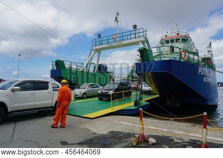 Labuan,malaysia-june 3,2019:a Ro Ro Ferry In Dock Unloading The Vehicles At Labuan,malaysia.