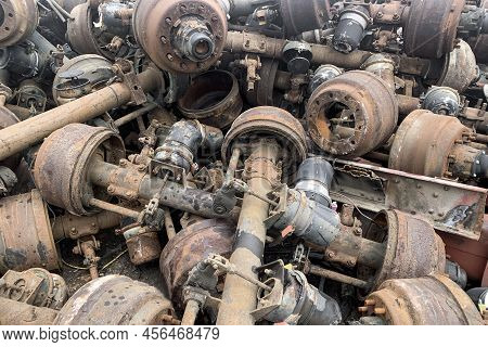 Pile Of Old Rusty Truck Axle For Reusing, Used Automotive Part For Sale, Old Rear Differential Of Tr