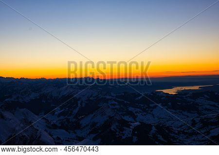 Sunset View From Santis Peak Mountain Switzerland. Spectacular View, Sunset. Winter Snow Covered Mou