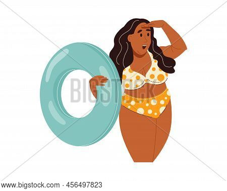 African American Funny Plus Size Woman In Bikini Holding Inflatable Ring And Looking Into The Distan