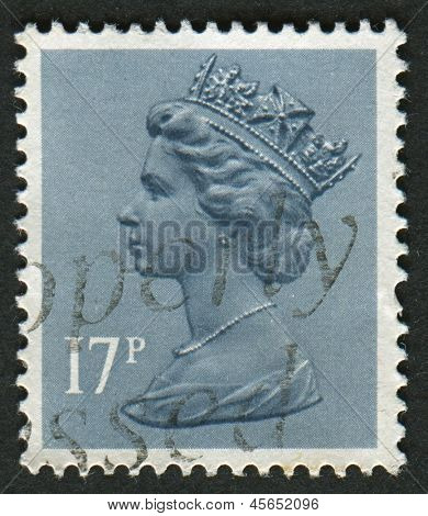 UK-CIRCA 1983:A stempel trykt i UK viser billede af Elizabeth II er den forfatningsmæssige monark af 16 