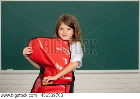 Happy Smiling Preteen Girl With Backpack, Kid Schoolgirl With Wears Schhol Uniform Holding Backpack 