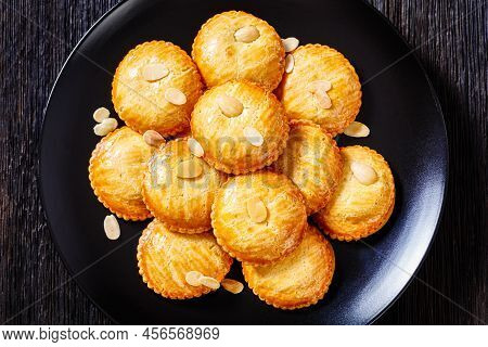 Dutch Almond Cookies Filled With Marzipan And Almonds Nuts Paste, Gevulde Koek, On Black Plate, Hori
