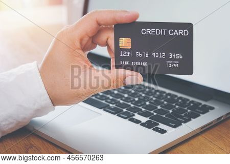 Online Payment, Man\'s Hands Holding Credit Card And Using Laptop, Online Credit Card Payment For Pu