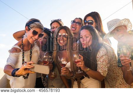 Group Of Beautiful Women Enjoying Aperitif On The Terrace Celebrating A Birthday And A Future Weddin