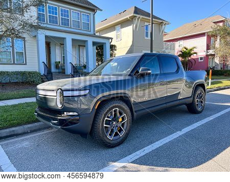 A Rivian Ev Truck Parked In A Neighborhood In Orlando, Florida.