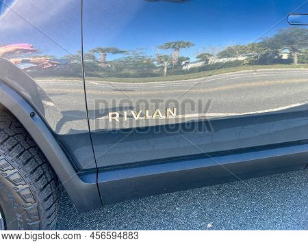 A Rivian Ev Truck Parked In A Neighborhood In Orlando, Florida.