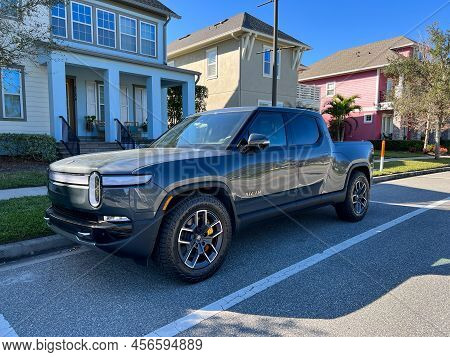 A Rivian Ev Truck Parked In A Neighborhood In Orlando, Florida.