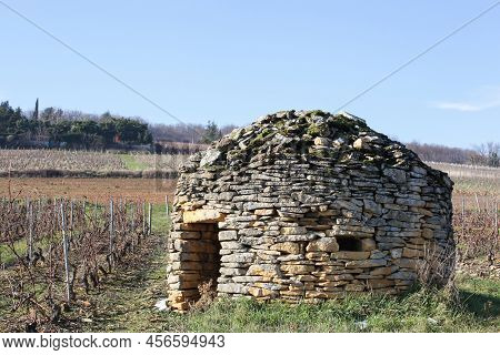 Old And Typical Stone Hut Called Cadole In French Language In The Vineyards Of Beaujolais, France