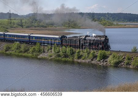 Helulya, Russia - June 11, 2022: Steam Locomotive L-0522 With Tourist Retro Train 