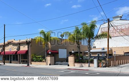 Santa Ana, California - 17 Jun 2022: Custom Auto Service And Yost Cine In The Historic Downtown Dist