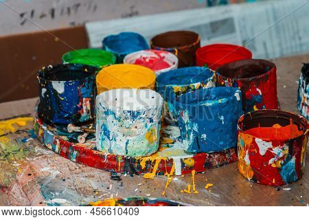 Jars Of Paints In An Art Workshop