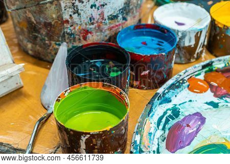 Jars Of Paints In An Art Workshop