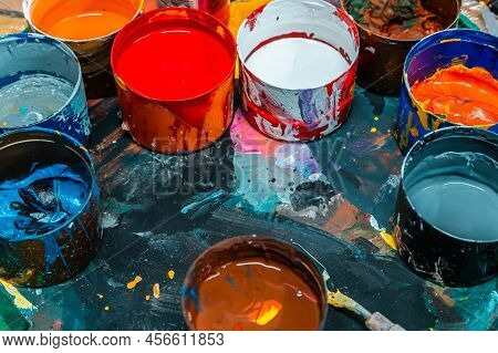 Jars Of Paints In An Art Workshop