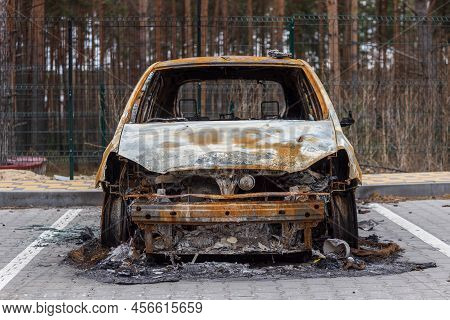 Hostomel, Kyev Region  Ukraine - 09.04.2022: Shot Cars. On The Streets Of Irpin. Cities Of Ukraine A