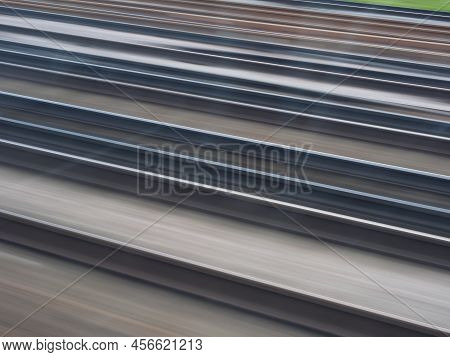 A Semiabstract Close-up Of Railway Tracks With Motion Blur