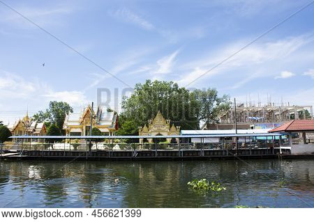 View Landscape Of Khlong Damnoen Saduak Canal River And Water Flowing With Cityscape Countryside Rur