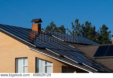 Photovoltaic Panels On The Roof. Roof With Solar Panels. View Of The Solar Panels.