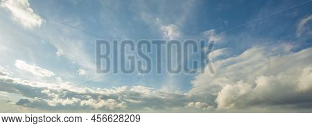 Panorama Sky With Clouds On A Sunny Day. Beautiful Flaffy Clouds.