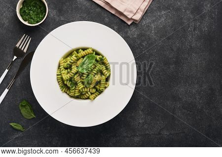 Italian Fusilli Pasta With Pesto. Fusilli Pasta With Basil Pesto And Herbs, Parmesan Cheese, Basil A